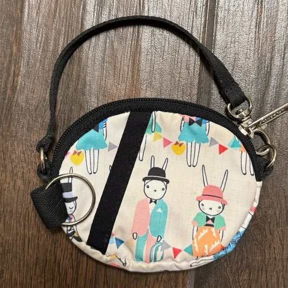 LeSportsac Round Wristlet Pouch in Cream with Multicolor Bunny Picnic Print - Picture 8 of 10
